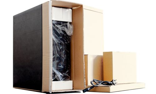 Unpacking,Black,Personal,Computer,,Back,View,,Cellophane,Packaging.,Many,Boxes